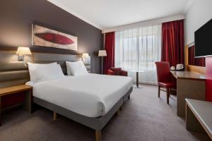 Postel nebo postele na pokoji v ubytování Radisson Blu Hotel, Durham