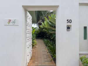 an empty hallway with a speed limit sign on a door at Radisson Resort Pondicherry Bay in Pondicherry