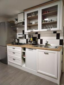 Kuchyňa alebo kuchynka v ubytovaní BonBon condominium
