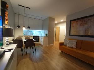 Kuchyňa alebo kuchynka v ubytovaní Apartament Amber - AZW Gdańsk