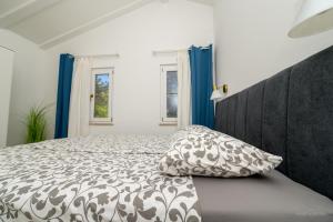 Postel nebo postele na pokoji v ubytování STONE HOUSE LEANI + 27 fotografií