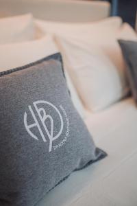 A bed or beds in a room at Dbhousetaormina