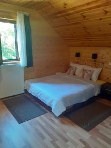 Postel nebo postele na pokoji v ubytování Apartman Marica