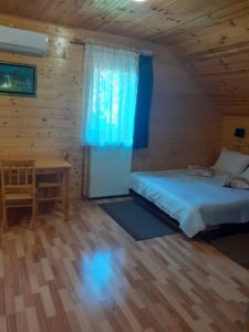 Postel nebo postele na pokoji v ubytování Apartman Marica