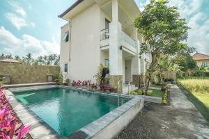 Bazén v ubytování Putih DCarik Ubud nebo v jeho okolí
