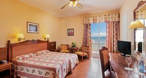 TV a/nebo společenská místnost v ubytování Hotel Monopol