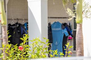 a group of clothes hanging on a house at Hotel Santa Barbara Miyakojima Resort in Miyako-jima