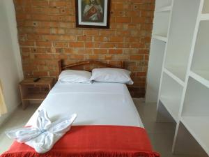 Voodi või voodid majutusasutuse Aparta-Hotel LENEMBERGER toas