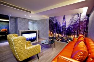 TV a/nebo společenská místnost v ubytování FX INN Kaohsiung Zhonghua Road Branch