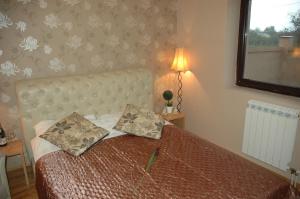 Postel nebo postele na pokoji v ubytování Guest House Maja