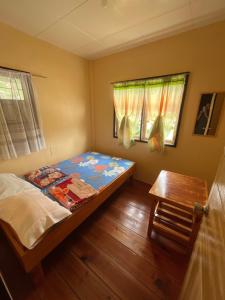 Postel nebo postele na pokoji v ubytování Vilma's Homestay