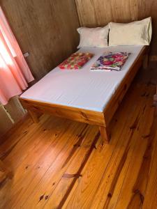 Postel nebo postele na pokoji v ubytování Vilma's Homestay