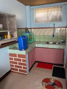 Kuchyň nebo kuchyňský kout v ubytování Vilma's Homestay