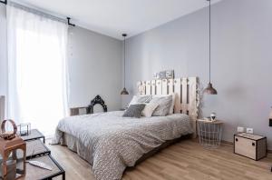 Ένα ή περισσότερα κρεβάτια σε δωμάτιο στο Appartement Le Patio - Stationnement privatif & Tram - proche Montpellier