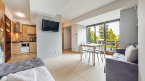 Kuchnia lub aneks kuchenny w obiekcie Apartamenty Sun & Snow Lido Sarbinowo