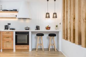 Kuchyňa alebo kuchynka v ubytovaní Naxian Icon Luxury Residence 3