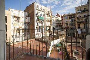 a view of a city from a balcony at 23PAR1007 Comfortable apartment in Paralel in Barcelona