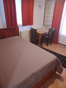 Posteľ alebo postele v izbe v ubytovaní Arka Metsovo