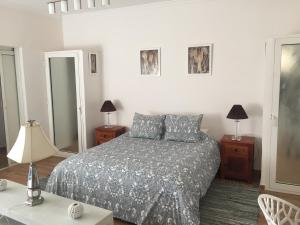 Letto o letti in una camera di Palais d'hôtes