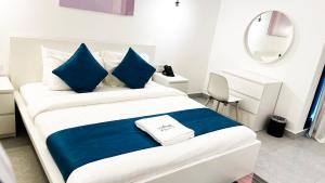 Postel nebo postele na pokoji v ubytování Terminal Inn By Edar City + 30 fotografií