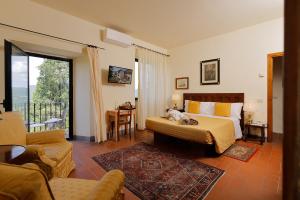 Posteľ alebo postele v izbe v ubytovaní Relais Vignale & Spa + 37 fotografií
