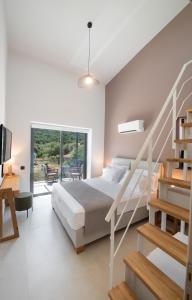 Posteľ alebo postele v izbe v ubytovaní RIZOMATA LUXURY VILLAS + 37 fotografií