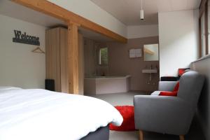 Voodi või voodid majutusasutuse L'auberge de Noiraigue toas