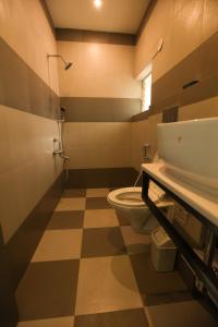 Koupelna v ubytování Coastal Pearl Hotel Miramar Panaji
