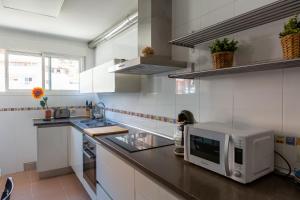 Kuchyň nebo kuchyňský kout v ubytování Apartamento Catania en Aguadulce con vistas al mar