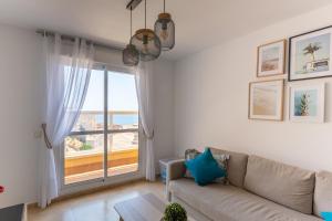 Posezení v ubytování Apartamento Catania en Aguadulce con vistas al mar