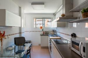Kuchyň nebo kuchyňský kout v ubytování Apartamento Catania en Aguadulce con vistas al mar