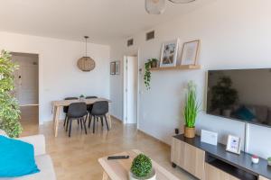 Posezení v ubytování Apartamento Catania en Aguadulce con vistas al mar