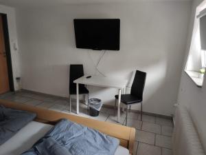 TV a/nebo společenská místnost v ubytování Schönes einfaches zentrales Zimmer in Oldenburg