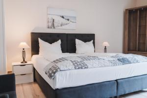 Postel nebo postele na pokoji v ubytování Hotel Aurora