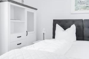 Postel nebo postele na pokoji v ubytování Hotel Aurora