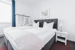 Postel nebo postele na pokoji v ubytování Hotel Aurora