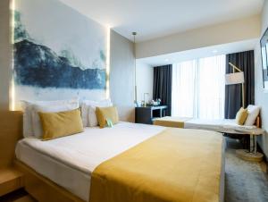 เตียงในห้องที่ Hotel 86 By Katipoğlu +32 ภาพ