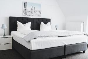 Postel nebo postele na pokoji v ubytování Hotel Aurora