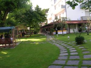 A garden outside Hotel La Bussola