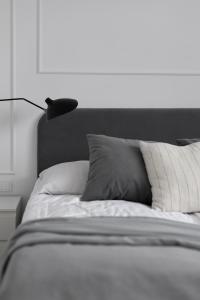 Posteľ alebo postele v izbe v ubytovaní Apartamenty Rodzinne Zdrojowe
