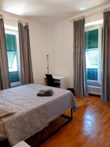 Postel nebo postele na pokoji v ubytování Genova Rooms Serra C + 9 fotografií
