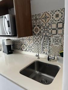 A kitchen or kitchenette at Estupendo apartamento en Estación-Centro, WIFI, Agua por Osmosis