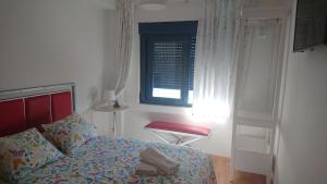 A bed or beds in a room at Cantos do Coido