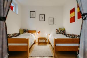 Voodi või voodid majutusasutuse Haus LUNA - Privatzimmer im sonnigen Südburgenland toas