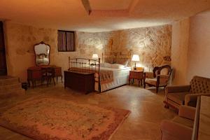 Postel nebo postele na pokoji v ubytování Yunak Evleri Cappadocia