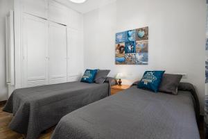 Posteľ alebo postele v izbe v ubytovaní Apartamento Zaida + 12 fotografií
