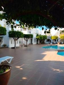 The swimming pool at or close to Apartamento Torrelaguna