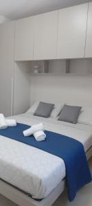 Katil atau katil-katil dalam bilik di Point G&V Apartment Sea front Bugibba