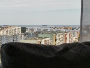 a view of a city from a window at MustSEA Gdańsk Apartments with underground parking in Gdańsk