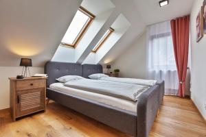 Posteľ alebo postele v izbe v ubytovaní Zaži Apartmány Mýto pod Ďumbierom